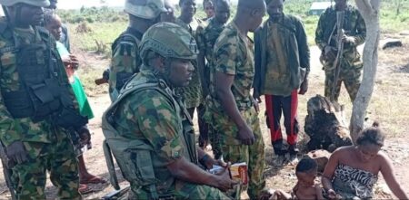Troops of the Nigerian Army with rescued kidnap victims